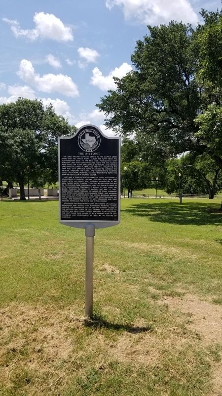 The 1957 Flood Marker in the park image. Click for full size.