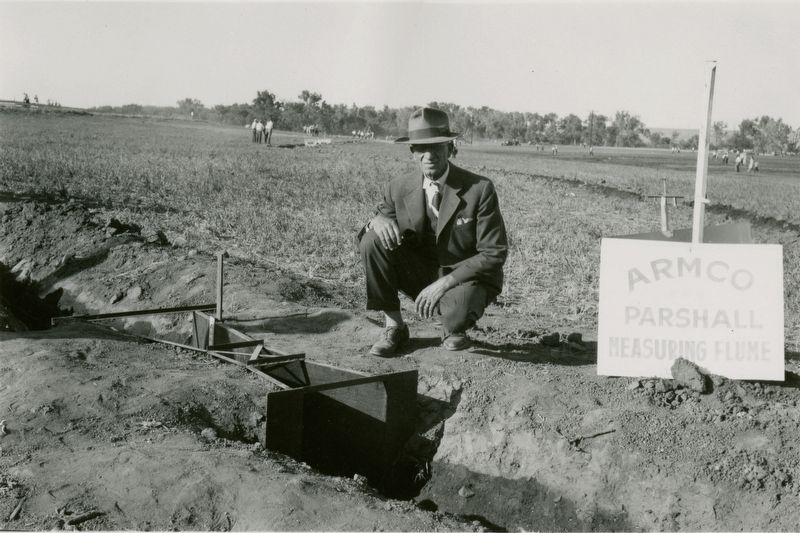 <i>Ralph Parshall next to Parshall measuring flume</i> image. Click for full size.