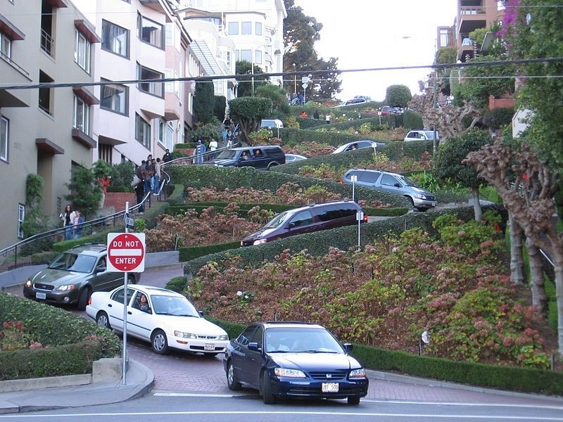 Cars maneuver slowly down Lombard Street, "The Crookedest Street in the World" image. Click for full size.