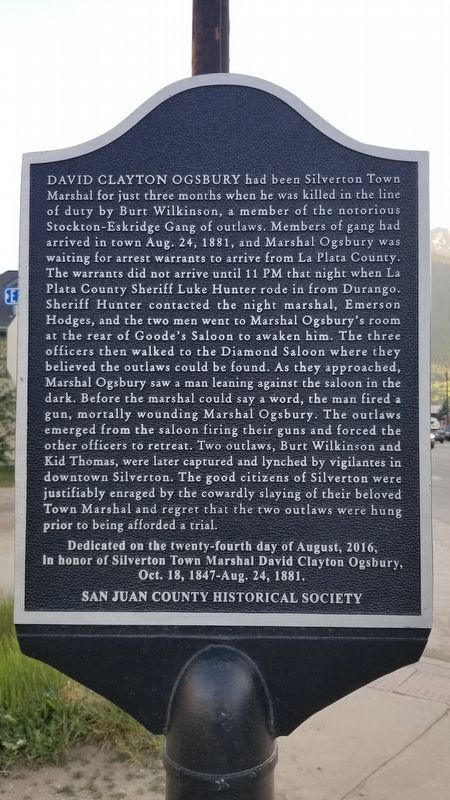 Reverse side - The Slaying of Town Marshal Clate Ogsbury Marker. Click for full size. Reverse side - The Slaying of Town Marshal Clate Ogsbury Marker image. Click for full size.
