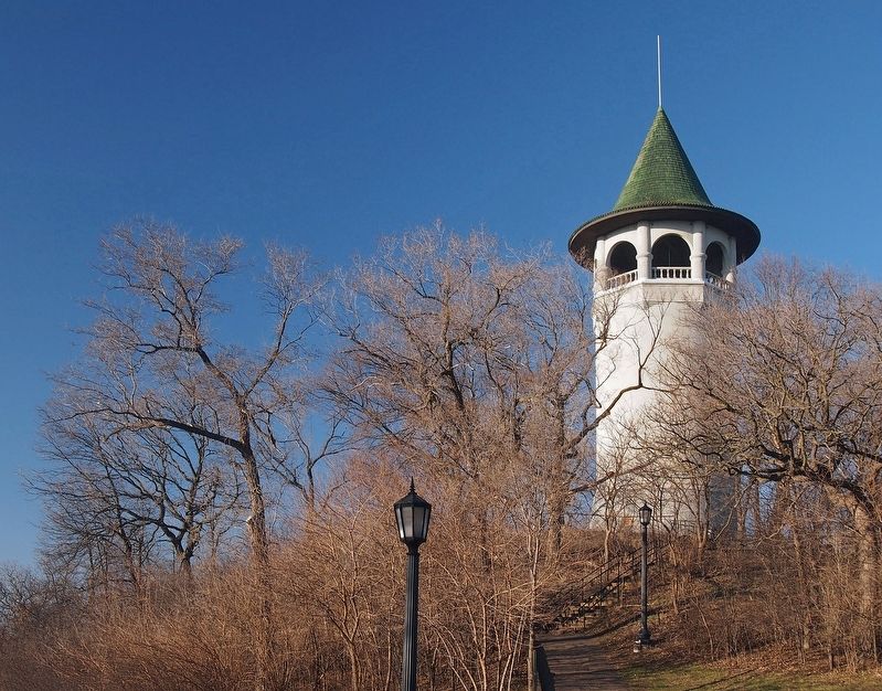 View of the water tower showing its distinctive "witch's hat" roof image. Click for full size.