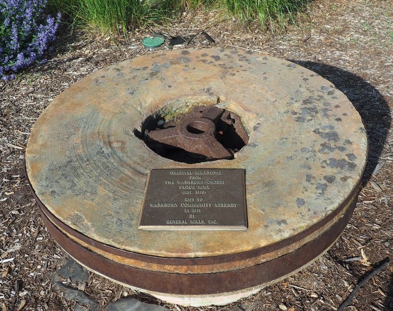 Millstone with marker. Click for full size. Millstone with marker image. Click for full size.