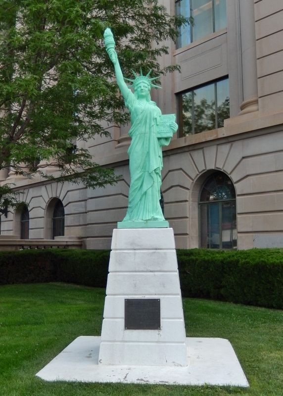 Replica of the Statue of Liberty Marker. Click for full size. Replica of the Statue of Liberty Marker image. Click for full size.