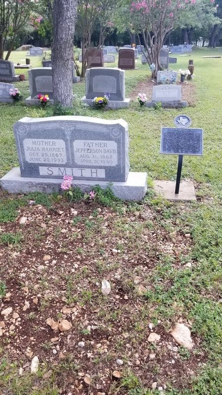 The gravestone of Jefferson Davis Smith and his wife with the marker image. Click for full size.