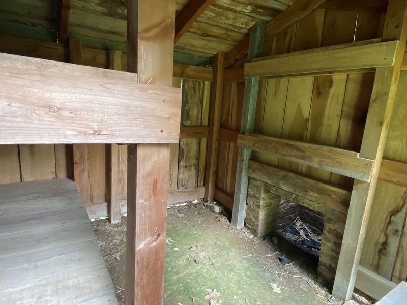 Inside of replica hut. image. Click for full size.