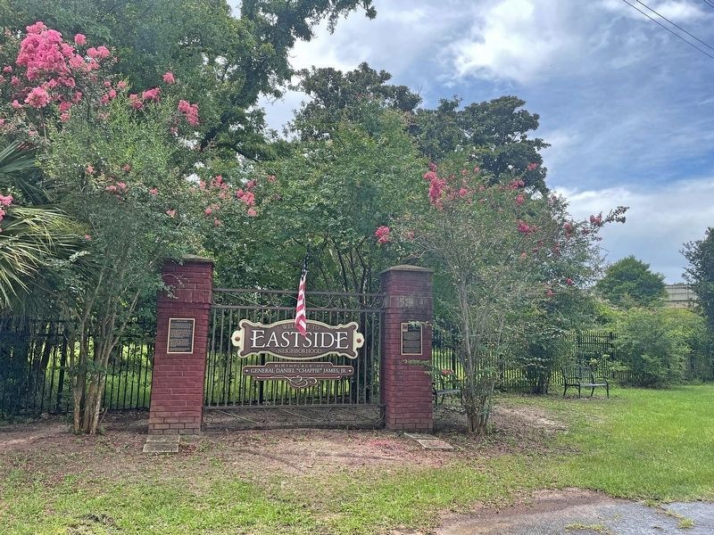 Marker (on right) at the Eastside neighborhood entrance sign. image. Click for full size.