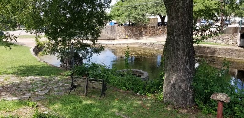 The view of the Site of the Old City Spring Marker along the creek image. Click for full size.