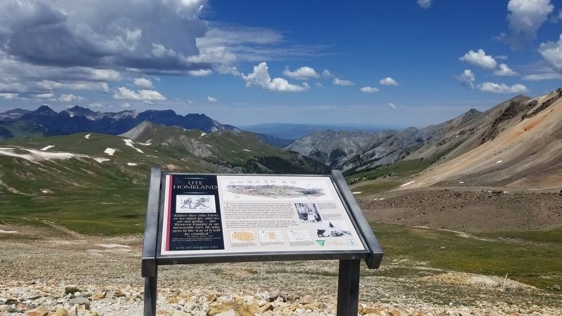 The Ute Homeland Marker with the view of multiple mountains. Click for full size. The Ute Homeland Marker with the view of multiple mountains image. Click for full size.