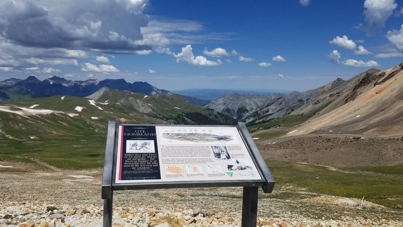 The Ute Homeland Marker with the view of multiple mountains image. Click for full size.