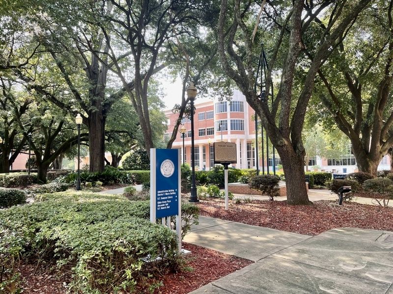 View towards marker and the H.T. Sampson Library. image. Click for full size.