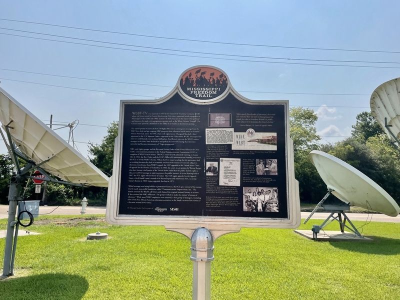 WLBT-TV Marker and satellite dishes. image. Click for full size.