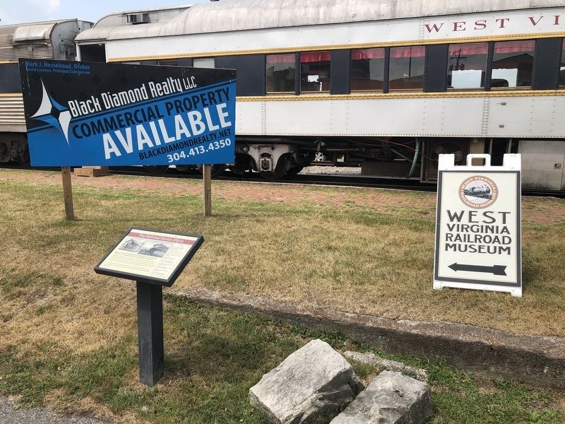The Railroad Builds Elkins Marker. Click for full size. The Railroad Builds Elkins Marker image. Click for full size.