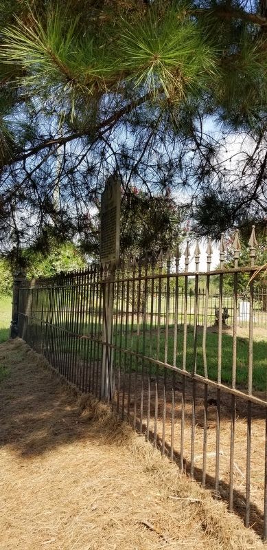 The Hebrew Benevolence Society Cemetery Marker is next to a tree. Click for full size. The Hebrew Benevolence Society Cemetery Marker is next to a tree image. Click for full size.