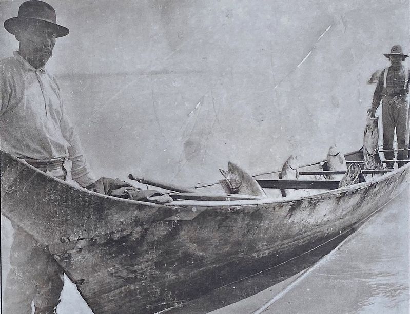 Marker inset: <i> Native fisherman with a canoe load of salmon.</i> image. Click for full size.