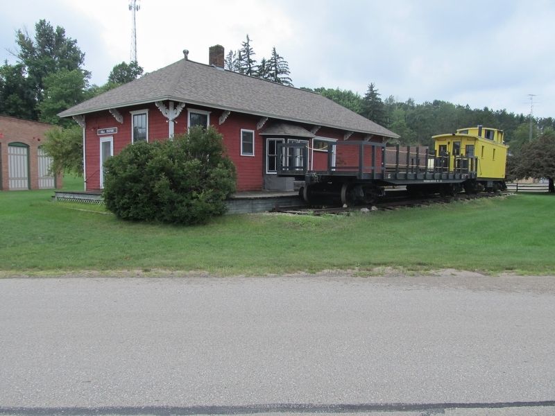Back side of depot with rolling stock. image. Click for full size.