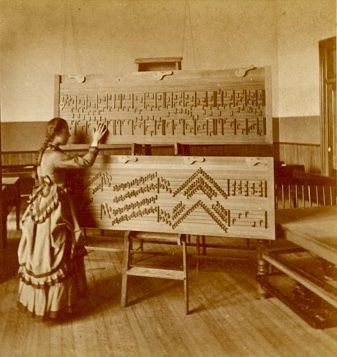 <i>State Asylum for the Deaf and Dumb, and Blind, Berkeley, girl learning music</i> image. Click for full size.