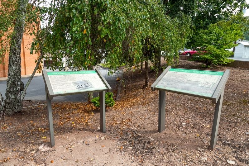 A Commercial Center and Bailey Row Interpretive Signs. Click for full size. A Commercial Center and Bailey Row Interpretive Signs image. Click for full size.