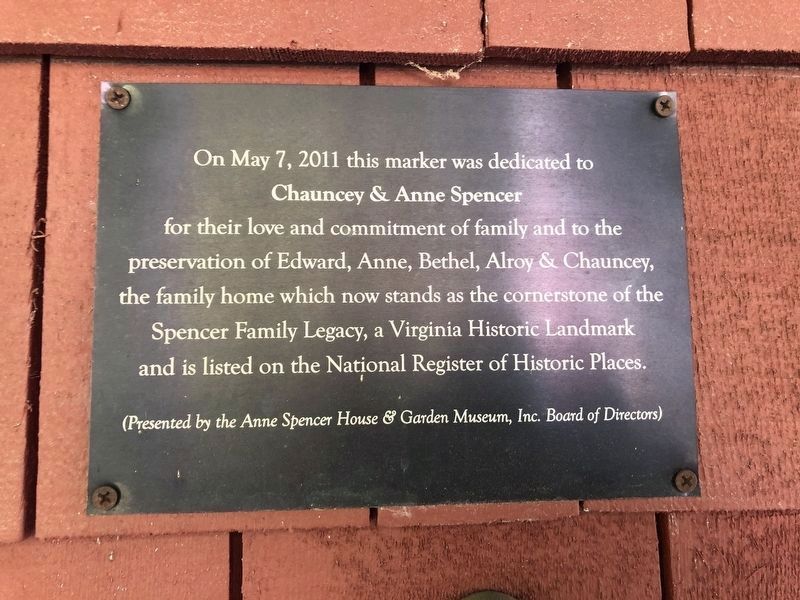 Dedication plaque on the house. Click for full size. Dedication plaque on the house image. Click for full size.