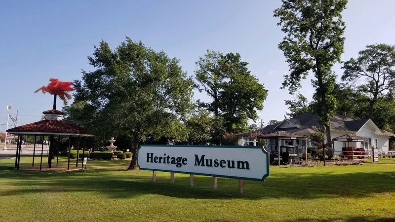 The view of the Railroad model and Marker behind the Heritage Museum sign image. Click for full size.