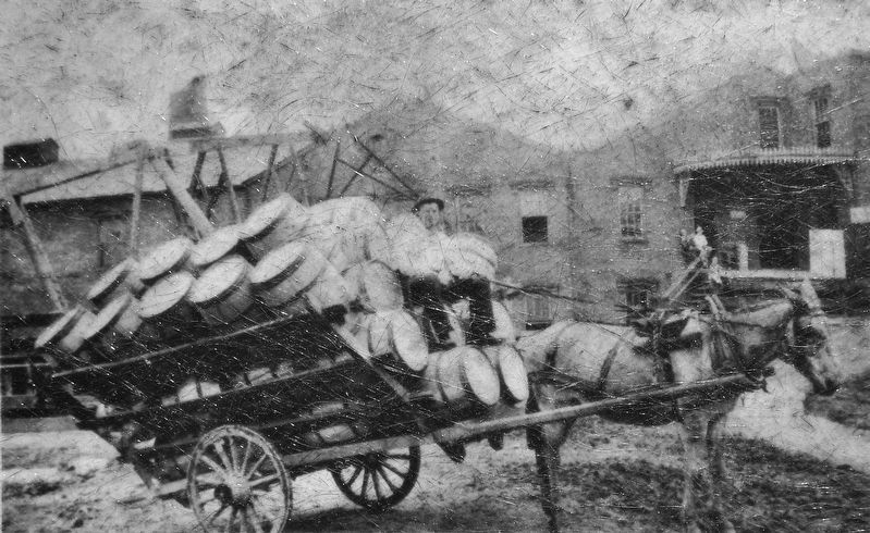Marker detail: Teamster Tom Clark bringing barrels to the Johnson Starch Company in 1888. image. Click for full size.