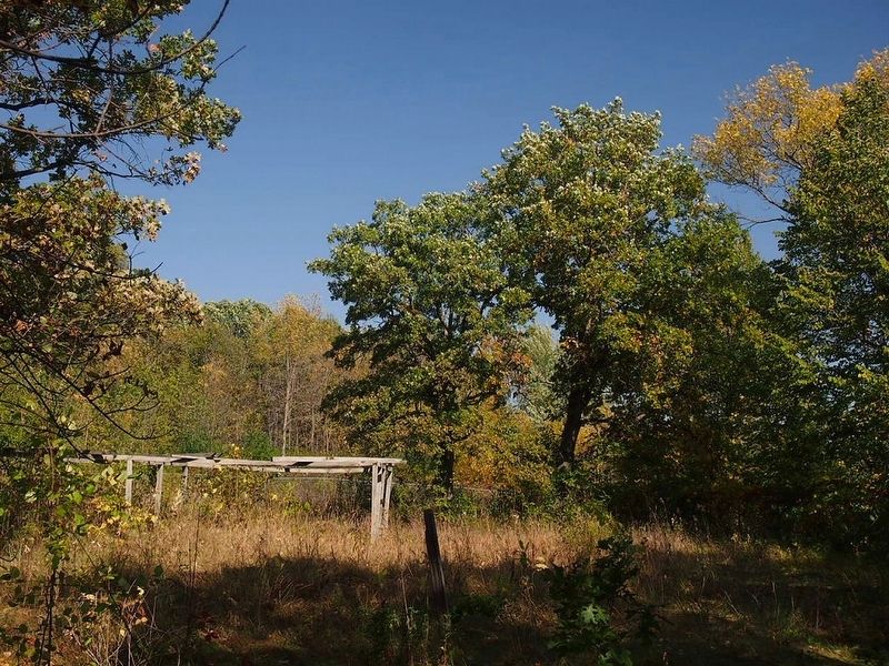 Site of the fort beyond the fence image. Click for full size.