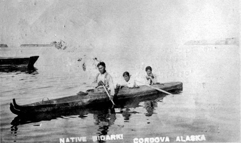 Natives in bidarka (skin boat), Cordova, Alaska image. Click for full size.