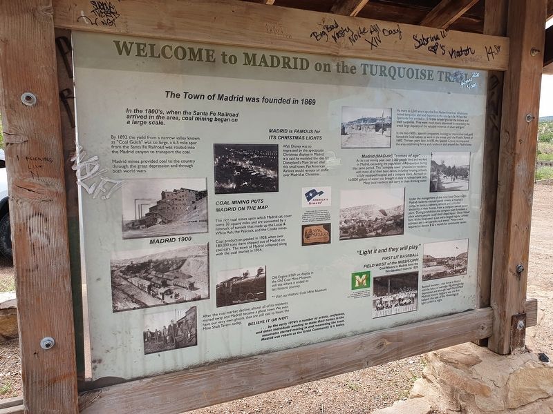 Welcome to Madrid on the Turquoise Trail Marker. Click for full size. Welcome to Madrid on the Turquoise Trail Marker image. Click for full size.