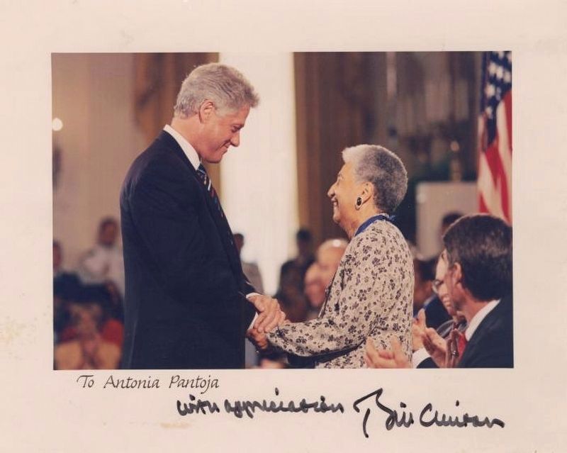 <i>Antonia Pantoja and the U.S President Bill Clinton</i> image. Click for full size.