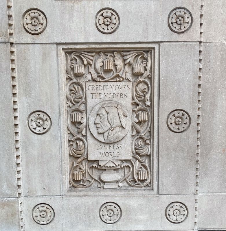 Trustees System Service Building - decorative relief: <i>Credit Moves the Modern Business World</i> image. Click for full size.