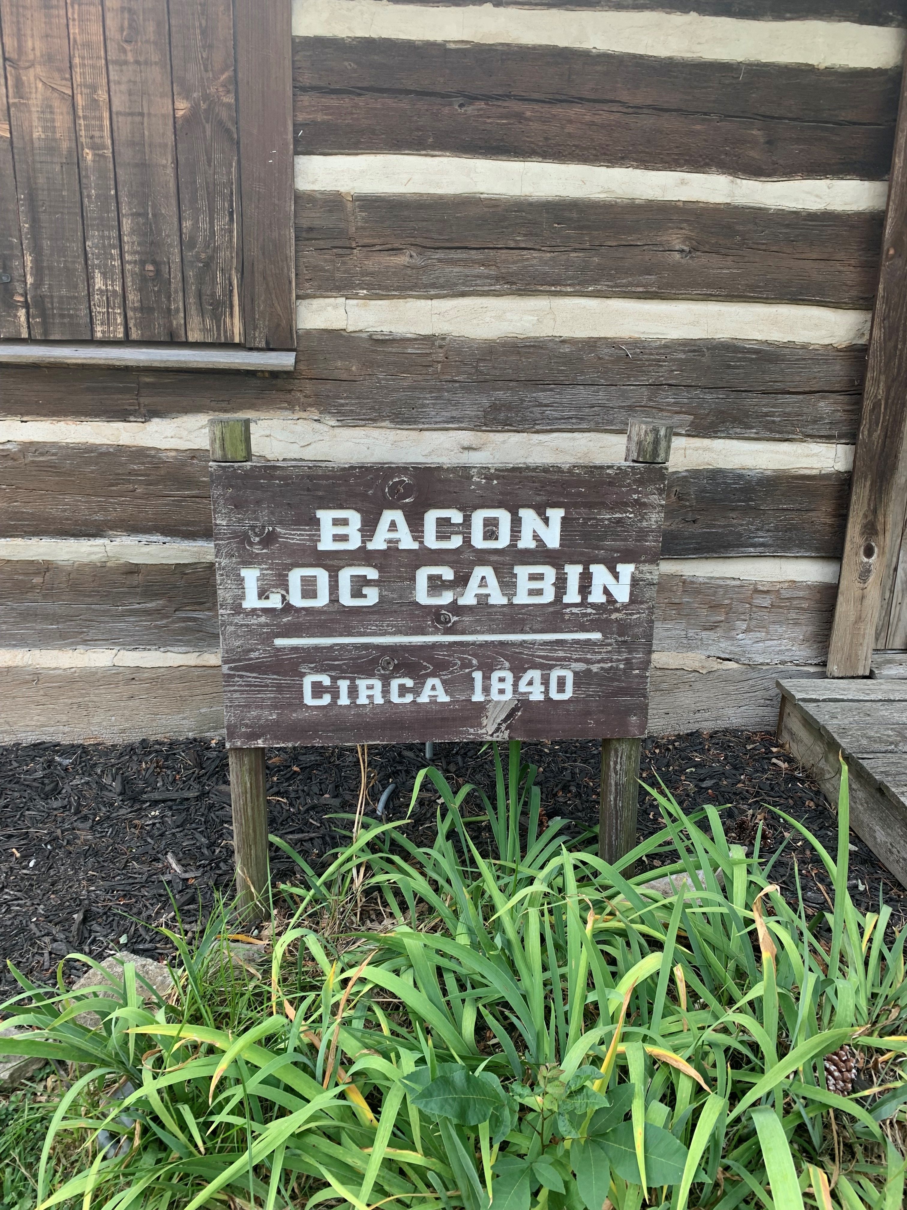 Bacon Log Cabin signage