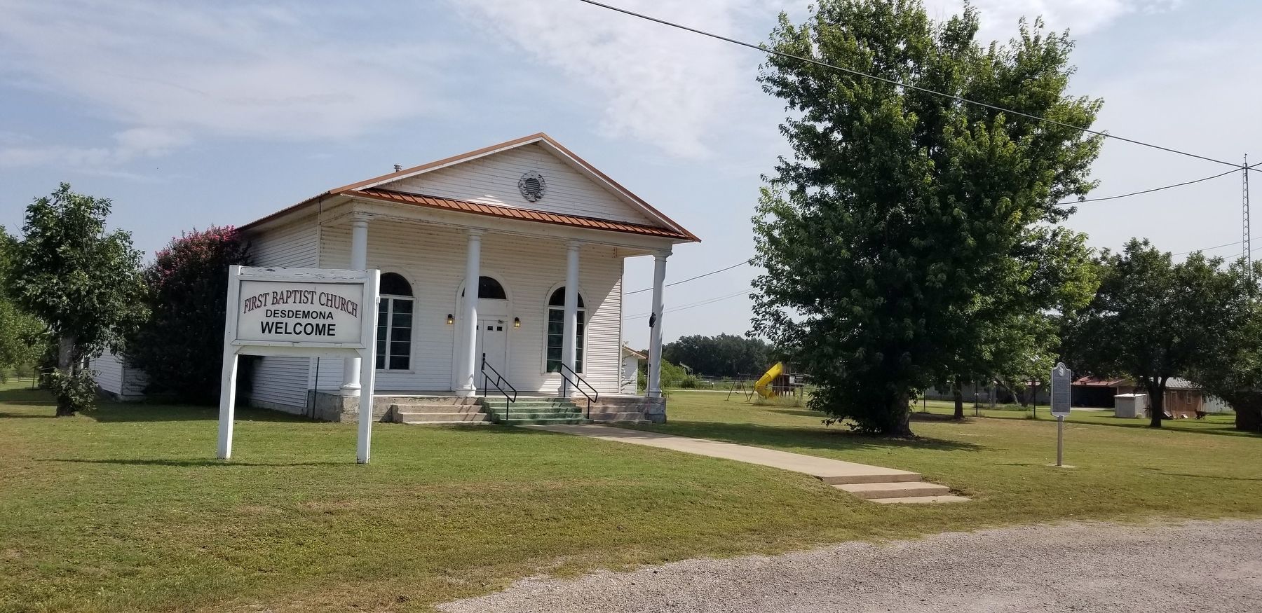 The view of the Desdemona First Baptist Church and Marker from the road image. Click for full size.
