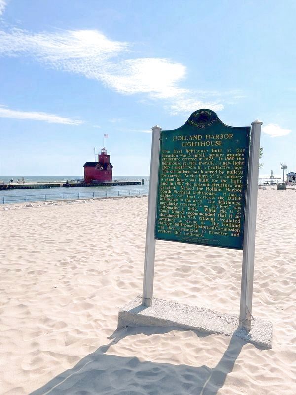 Holland Harbor Lighthouse / Holland Harbor Marker with Lighthouse in the Background image. Click for full size.