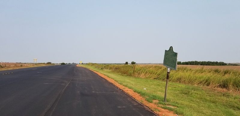 The view of the Military Road Crossing Marker from the highway image. Click for full size.