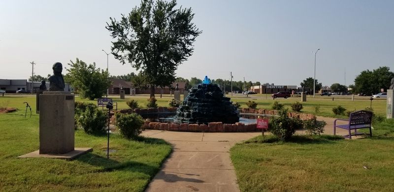 The view of the Quanah Parker (Kwania) Statue and Marker in the park image. Click for full size.