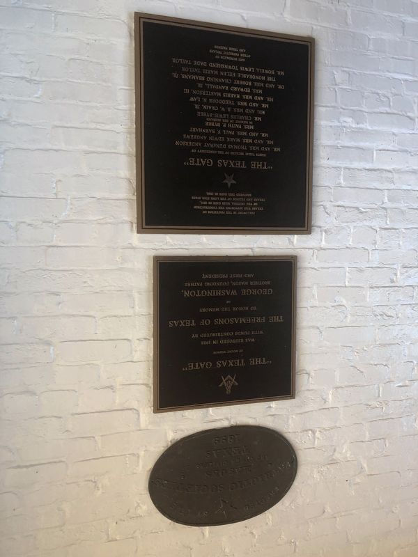 Plaques on the Texas Gate image. Click for full size.