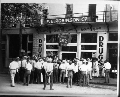 Crowd at F.E. Robinson's drugstore image. Click for full size.