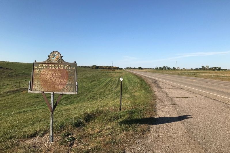 Wilder Homestead and Birthplace of Rose Wilder Lane Marker, from the south image. Click for full size.