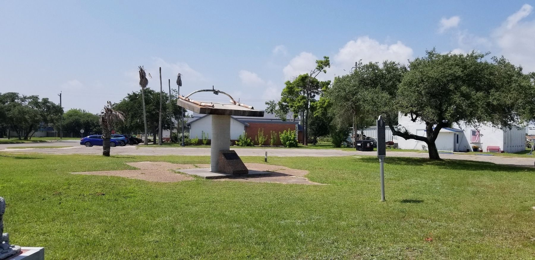 The UH1 Huey can be seen at the building in the back by the trash dumpster. Click for full size. The UH1 Huey can be seen at the building in the back by the trash dumpster image. Click for full size.