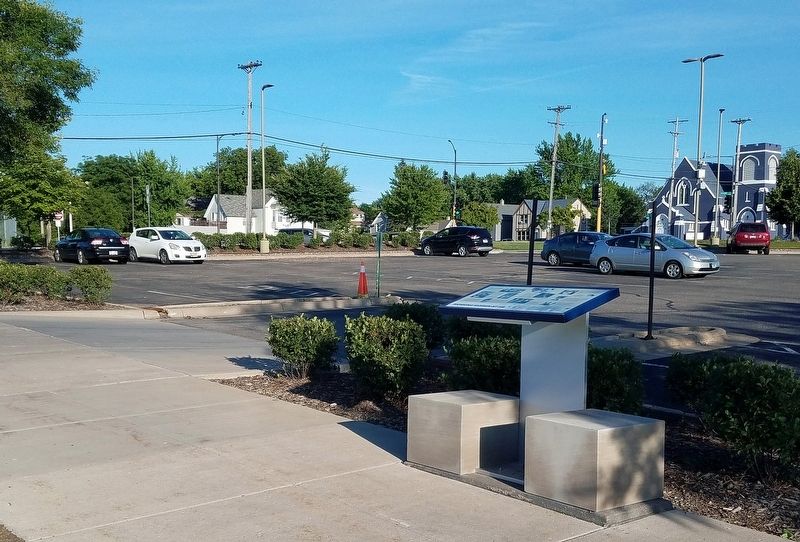 Marker beside the entrance to a parking lot east of the former 3M Administration Building. Click for full size. Marker beside the entrance to a parking lot east of the former 3M Administration Building image. Click for full size.