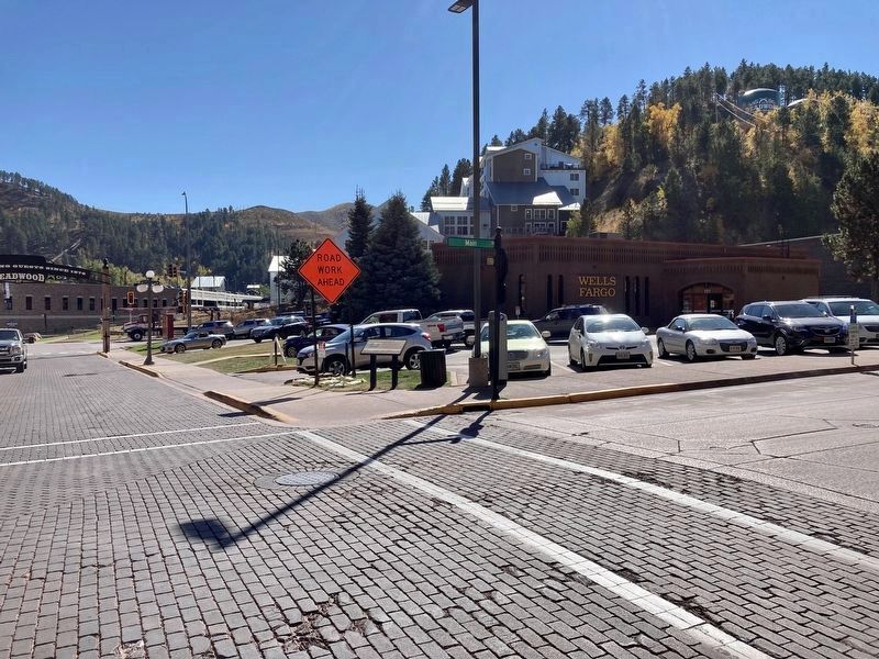 New marker can be seen on the corner in new location image. Click for full size.