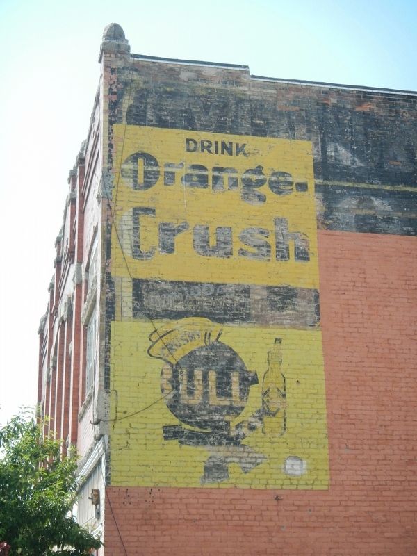 Old advertisment on the side of the Barich Block building image. Click for full size.