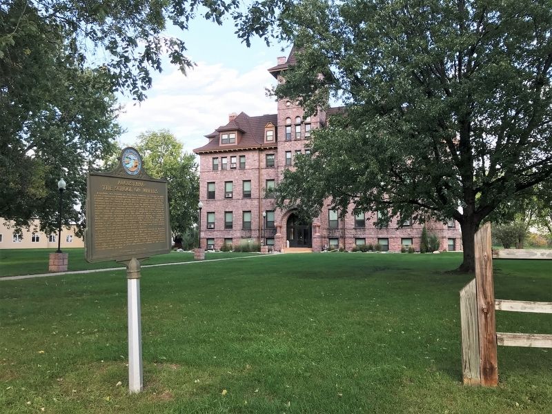 Augustana- The School on Wheels Marker & Old Main Building image. Click for full size.