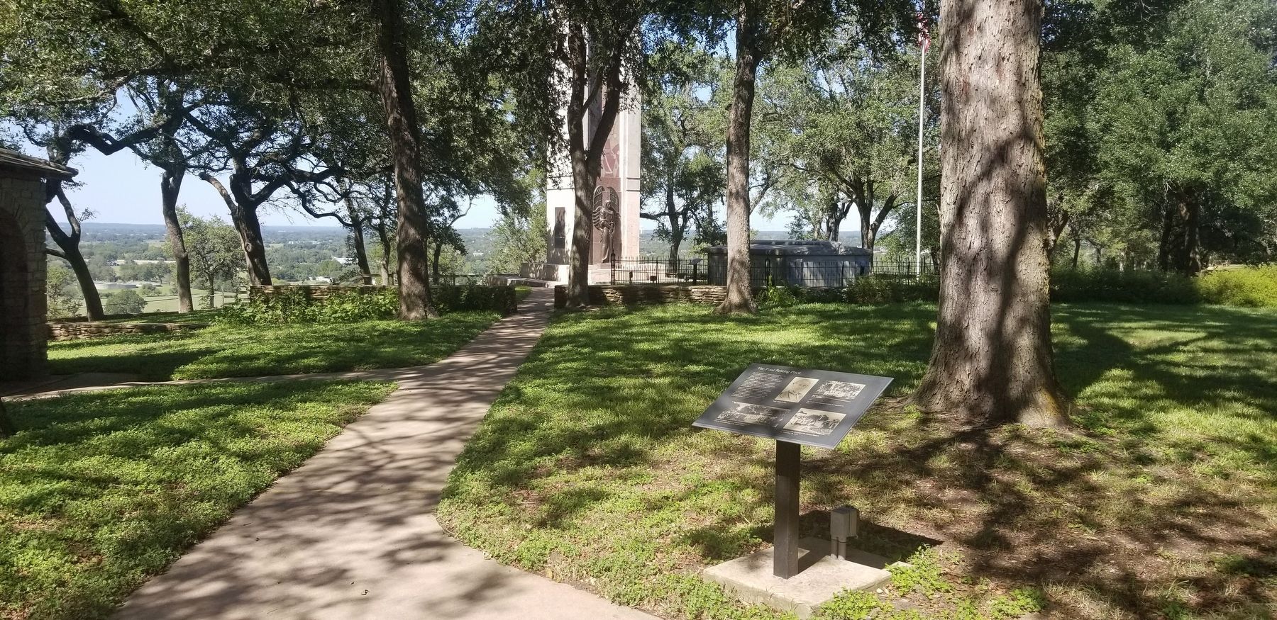 The view of the marker, memorial and tomb on the hill image. Click for full size.