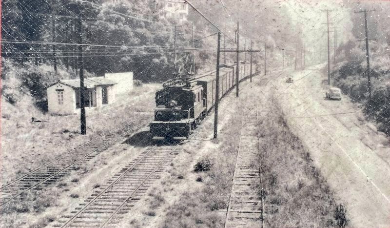 Marker inset: "A freight train rolls along the steep grade... image. Click for full size.