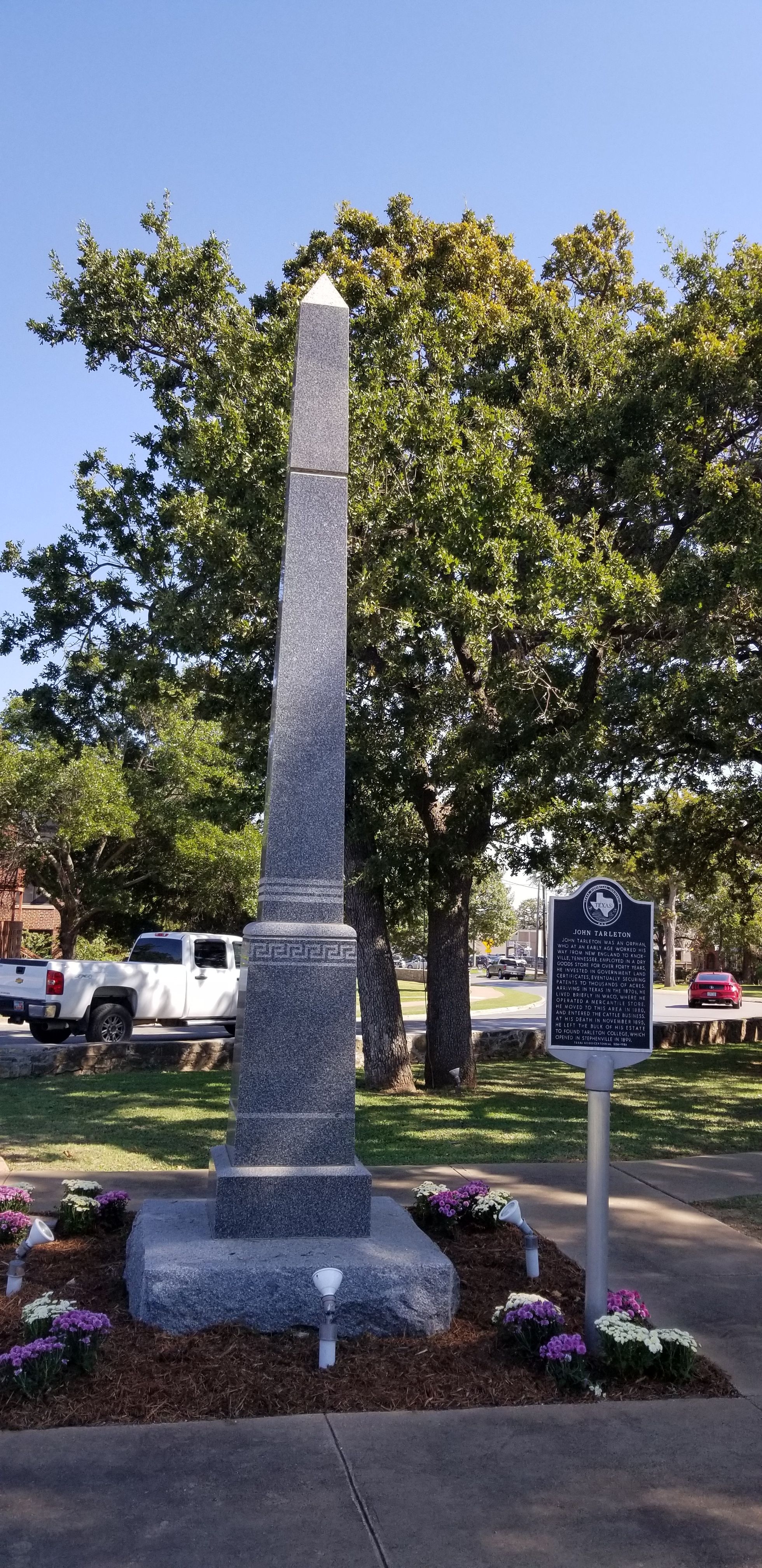 The John Tarleton Marker in a small park across from the cemetery