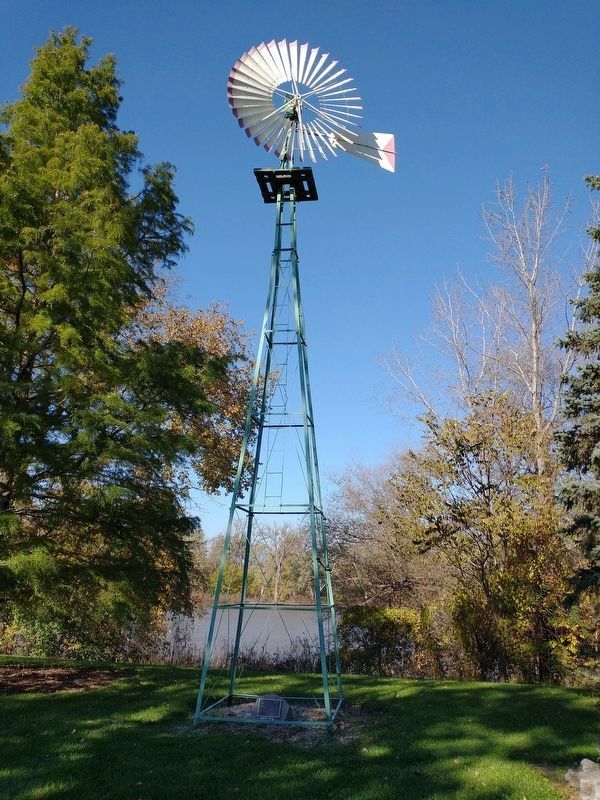 A nearby restored windmill and tablet image. Click for full size.