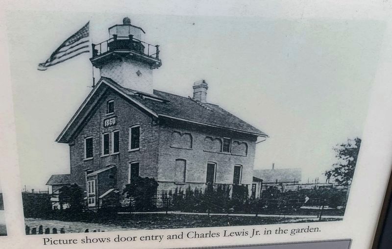 Picture shows door entry and Charles Lewis Jr. in the garden image. Click for full size.