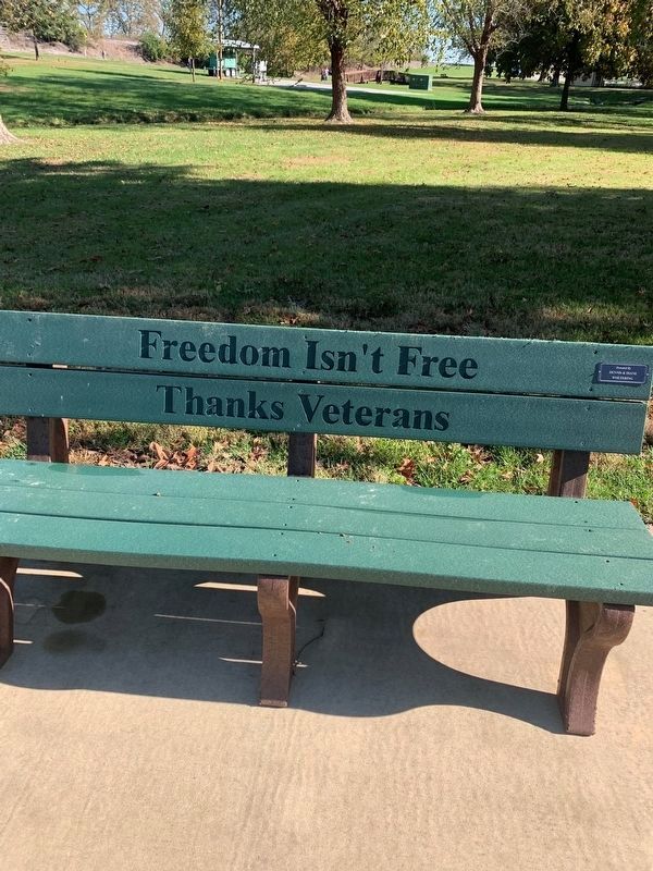 This bench is part of the memorial display. Click for full size. This bench is part of the memorial display image. Click for full size.