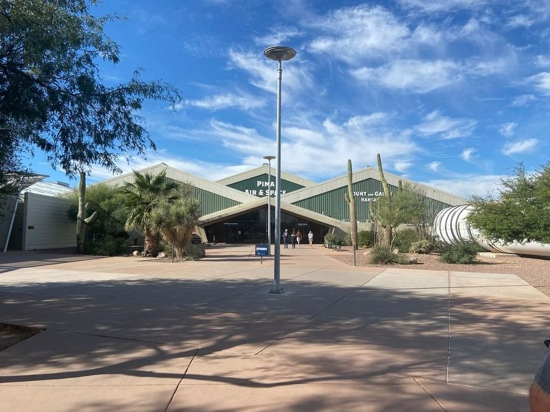 The entrance to the Pima Air & Space Museum next to the booster. Click for full size. The entrance to the Pima Air & Space Museum next to the booster image. Click for full size.