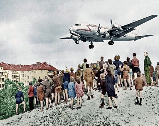 A C-54 landing at Tempelhof airport during the Berlin Airlift image. Click for full size.